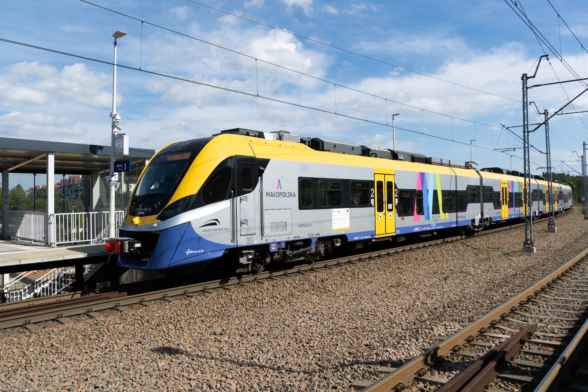 Newag Impuls train at Kraków Bronowice railway station. Electric low floor multiple unit. Koleje Małopolskie regional rail operator in Lesser Poland Voivodeship on September 22, 2023 in Krakow, Poland